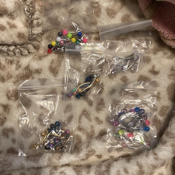 Clothes $10 each mirror $30 eye brow rings $20 for each lil pack and movies $5ec